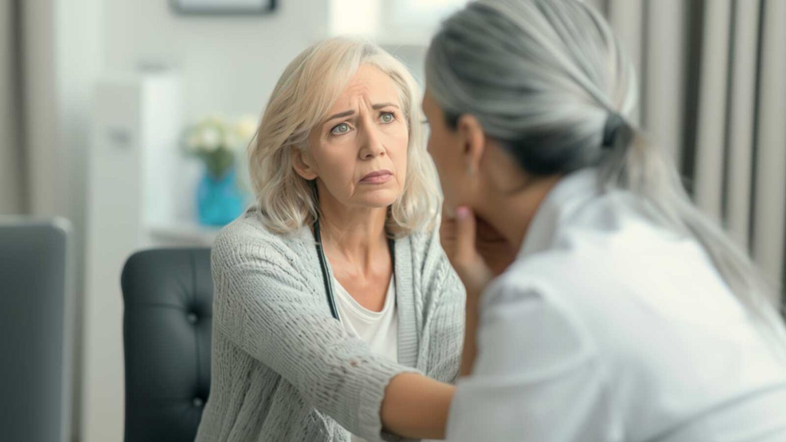 a woman in her menopausal years consulting about bleeding after menopause