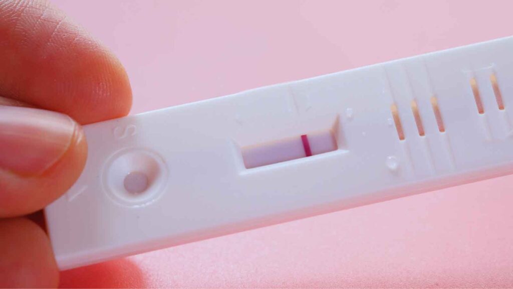 Negative pregnancy test highlighting fibroids and fertility challenges 
